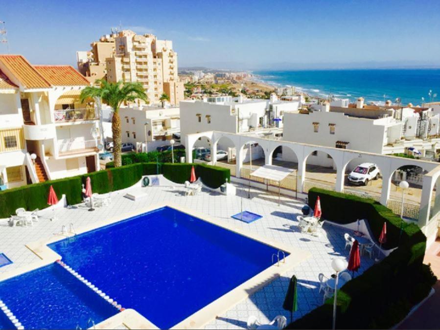 With Pool & Balcony Less Than 10min Walk To La Mata Beach!